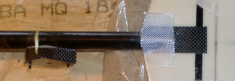 Ajout d'un coupon de fibre de verre pour renforcer l'attache de la dérive